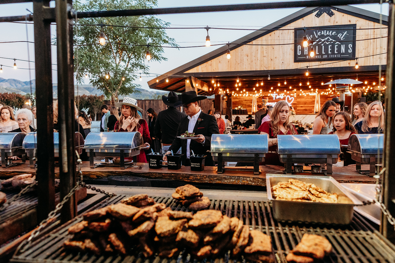 Dinner at a wedding at the venue at chilleens steak and chicken on the grill